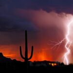 Lightning strikes at sundown as monsoon season in Arizona begins.