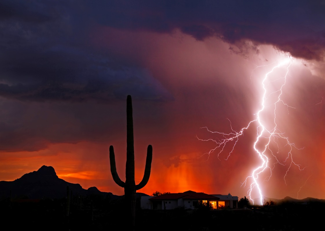 Lightning strikes at sundown as monsoon season in Arizona begins.